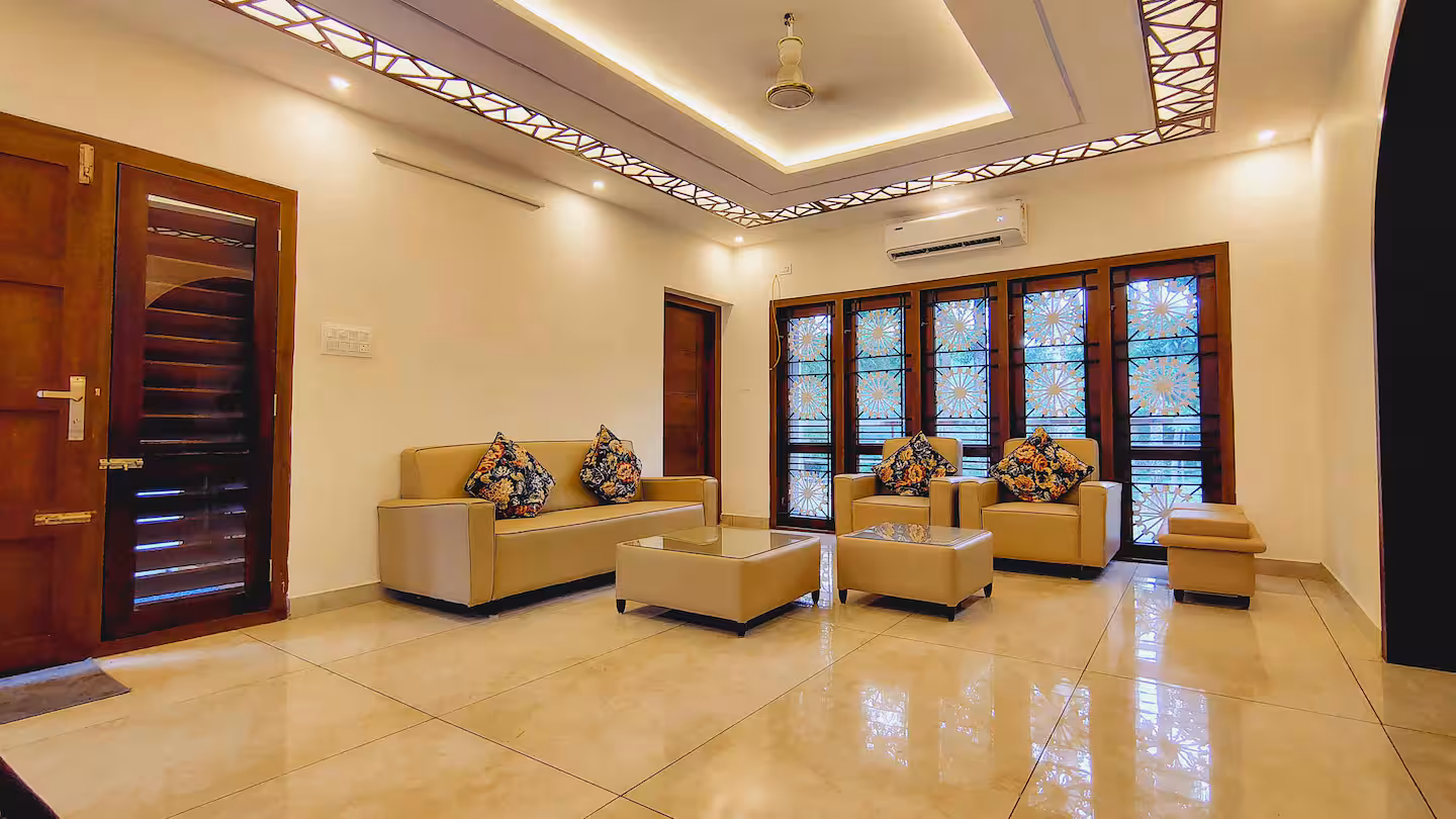 Modern living room and media lounge inside the riverside villa stay